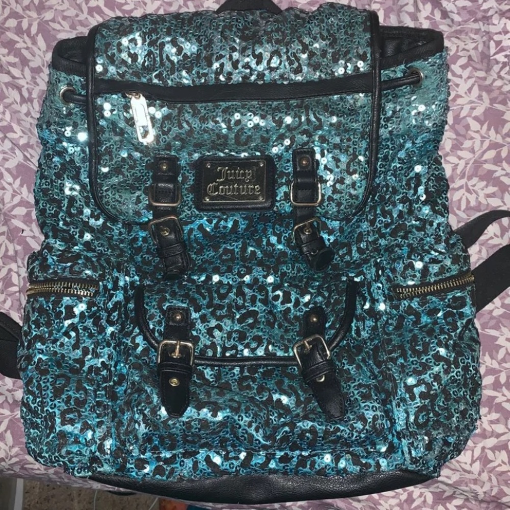 Juicy Couture Turquoise Cheetah Backpack.